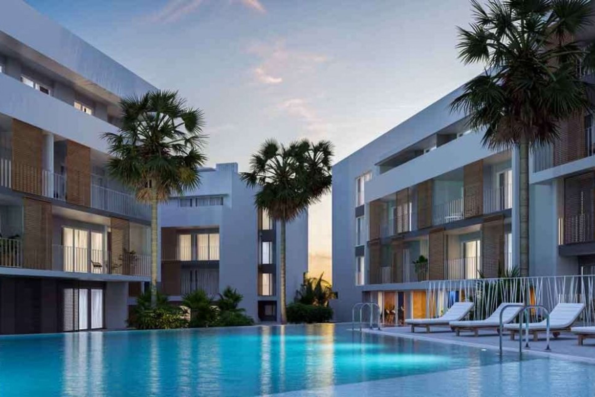 Modern facade of the development in Jávea with communal pool, close to the beach and marina