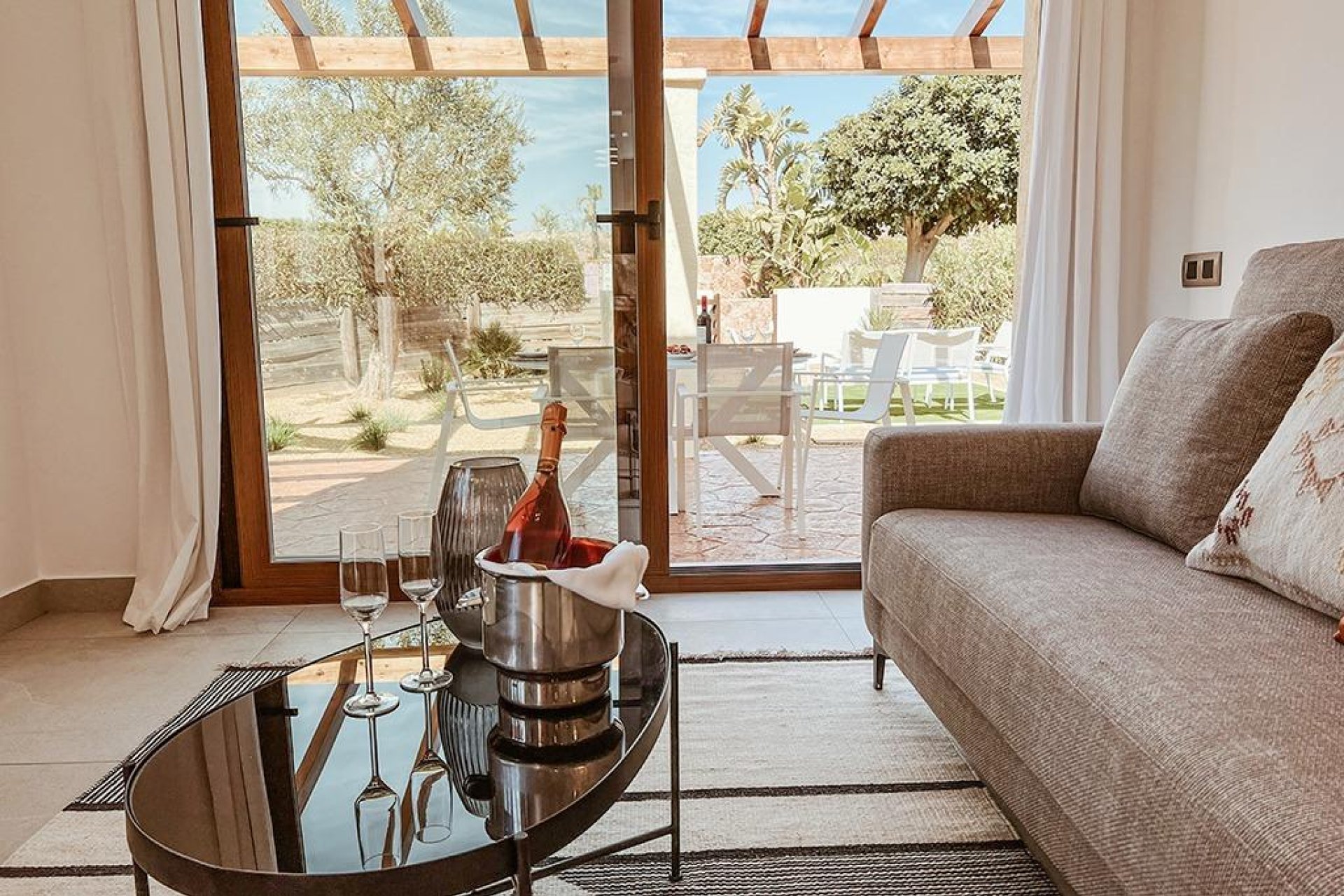 Open living room connected to outdoor terrace 